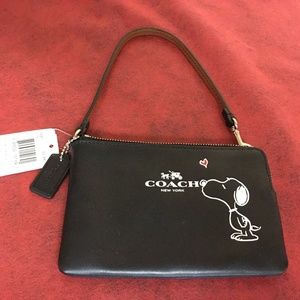 NWT Coach Snoopy Leather Wristlet. Black.